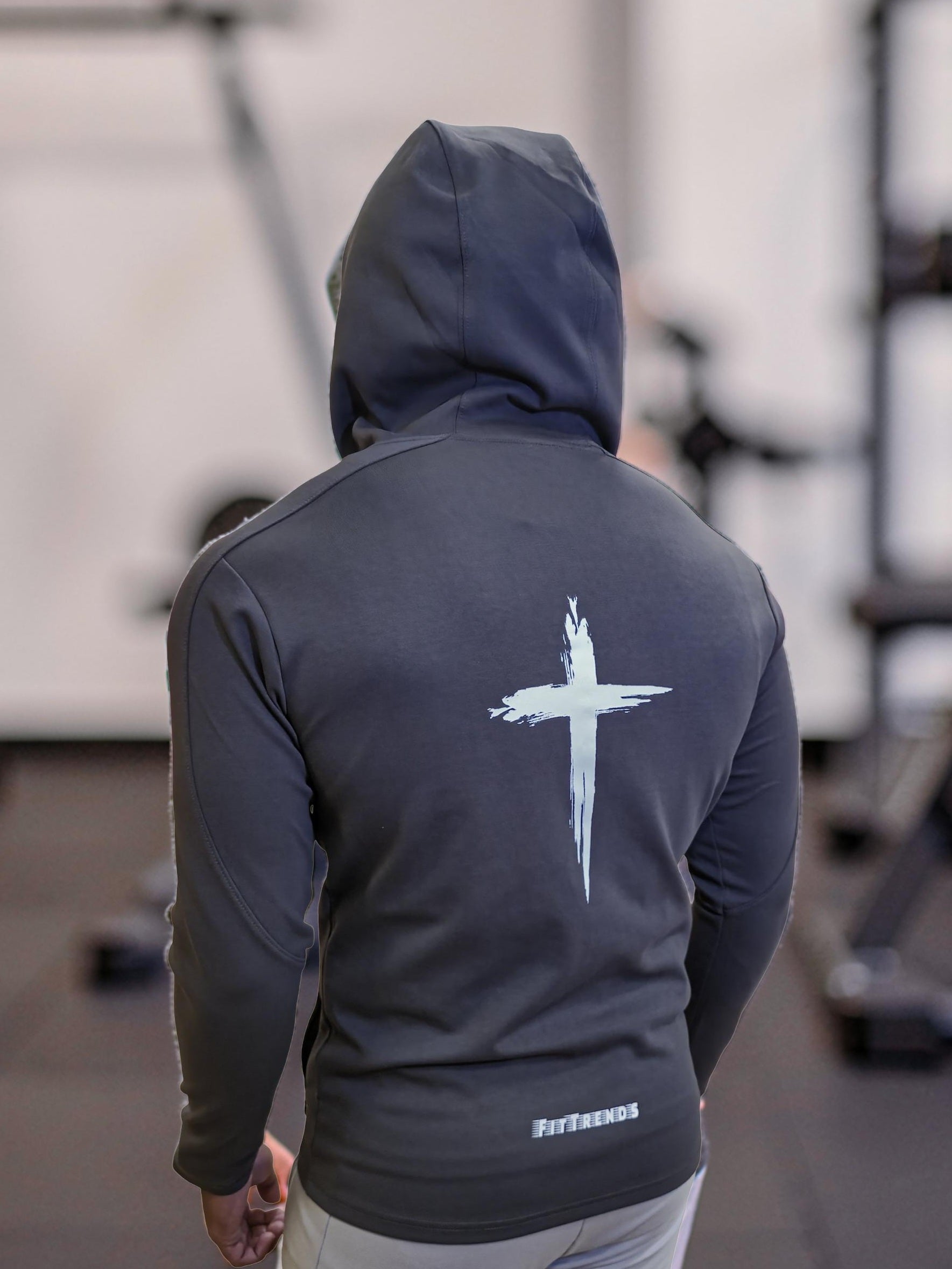 Keyword-rich "FitTrends Christian activewear jacket with back cross detail — men's performance gym wear