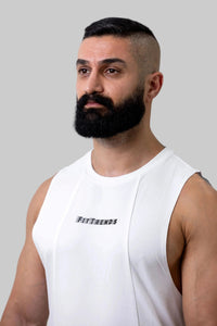 Man wearing a white sleeveless shirt with 'FitFriends' logo against a plain background