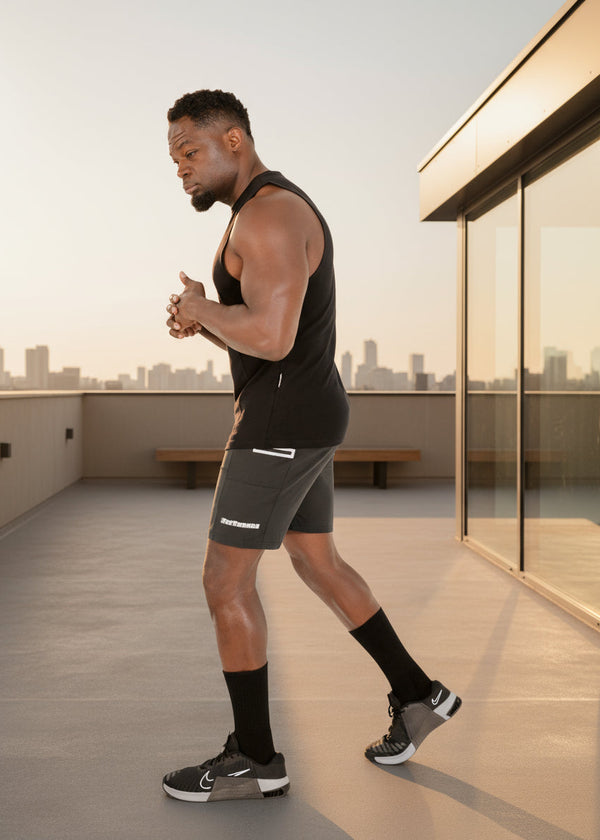 Model showcasing FitTrends lightweight performance shorts