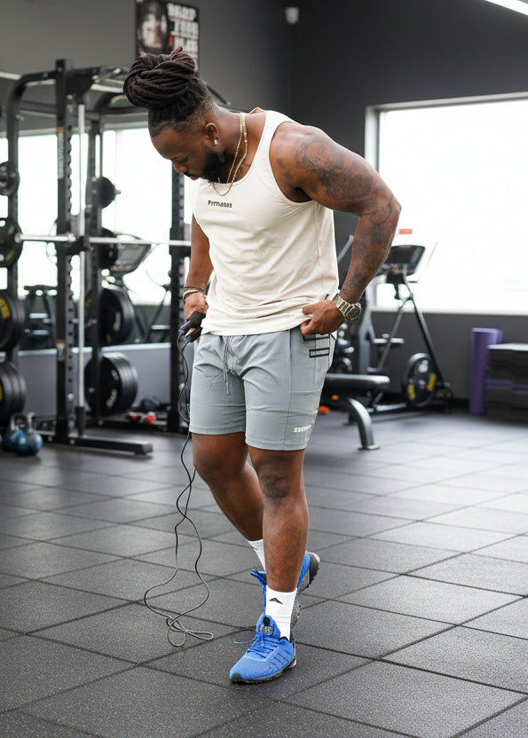 Person exercising with resistance bands on a grassy field